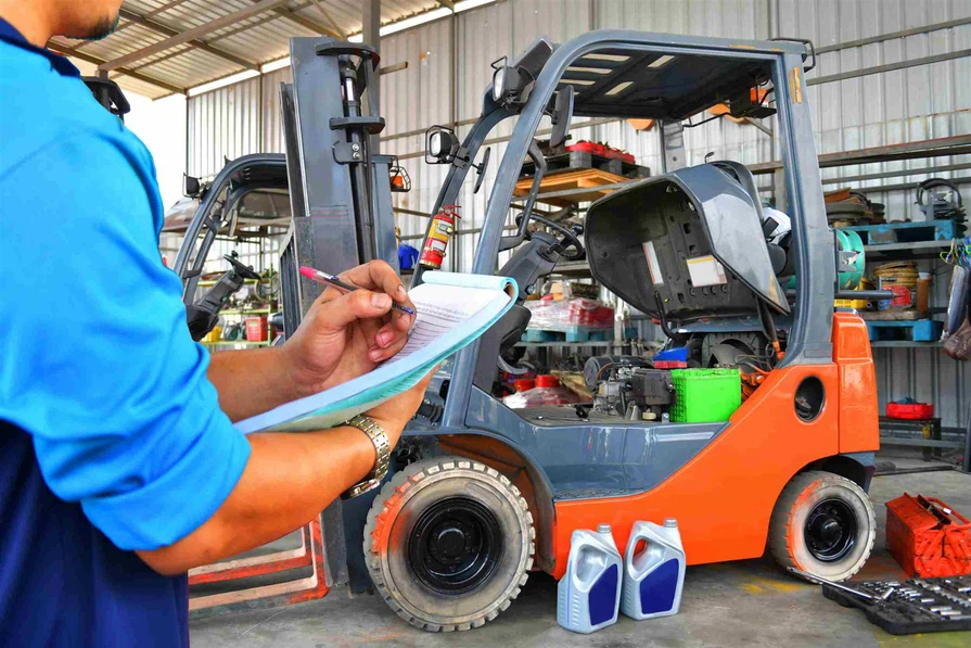 mechanic-is-checking-quality-maintenance-forklift-energy-fuel-concept1 mechanic-is-checking-quality-maintenance-forklift-energy-fuel-concept1